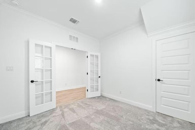 16921 Santiaguillo Trce, Manor, TX 78653 - carpeted spare room featuring french doors, ornamental molding, and baseboards