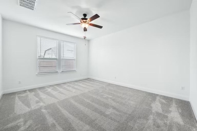 16921 Santiaguillo Trce, Manor, TX 78653 - unfurnished room with carpet, ceiling fan, and baseboards