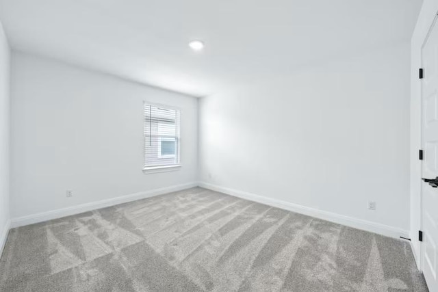 16921 Santiaguillo Trce, Manor, TX 78653 - spare room with carpet, baseboards, and recessed lighting