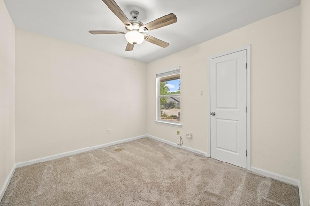 12214 Scribe Dr, Austin, TX 78759 - carpeted spare room with baseboards and ceiling fan