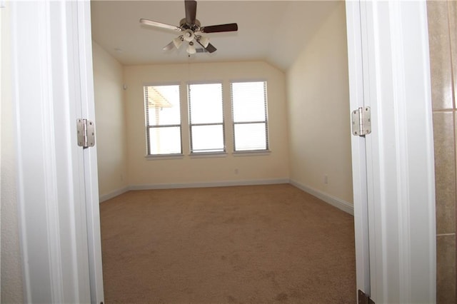 2204 Cabrillo Path, Leander, TX 78641 - spare room with carpet floors, ceiling fan, baseboards, and lofted ceiling
