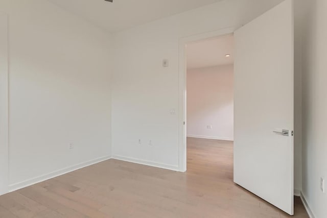 207 W Johanna Unit 108, Austin, TX 78704 - unfurnished room with light wood-style flooring and baseboards