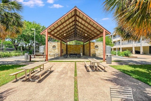 2401 E 6th St Unit 5077, Austin, TX 78702 - view of home's community with a patio area