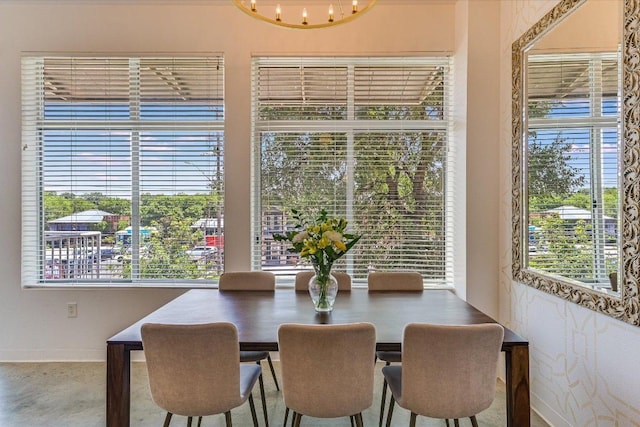 2401 E 6th St Unit 5077, Austin, TX 78702 - dining space with baseboards