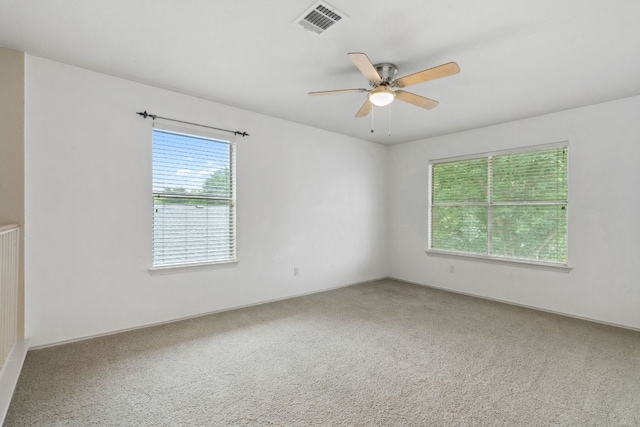 2917 Feathercrest Dr, Austin, TX 78728 - unfurnished room with a ceiling fan and carpet flooring