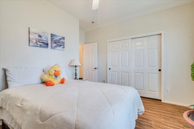 15115 Staked Plains Loop, Austin, TX 78717 - bedroom with wood finished floors, a closet, a ceiling fan, and baseboards