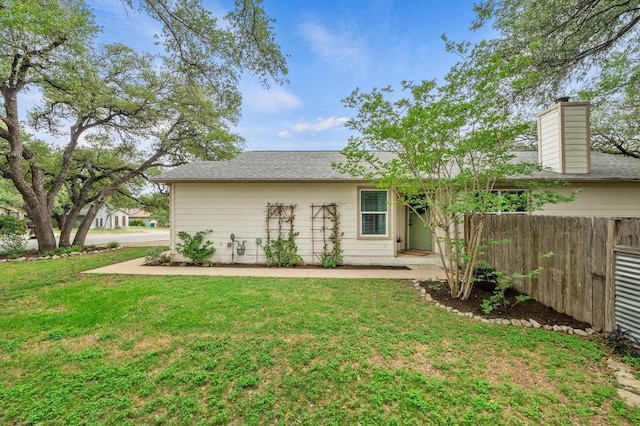 12721 Heinemann Dr, Austin, TX 78727 - view of front of home featuring a chimney