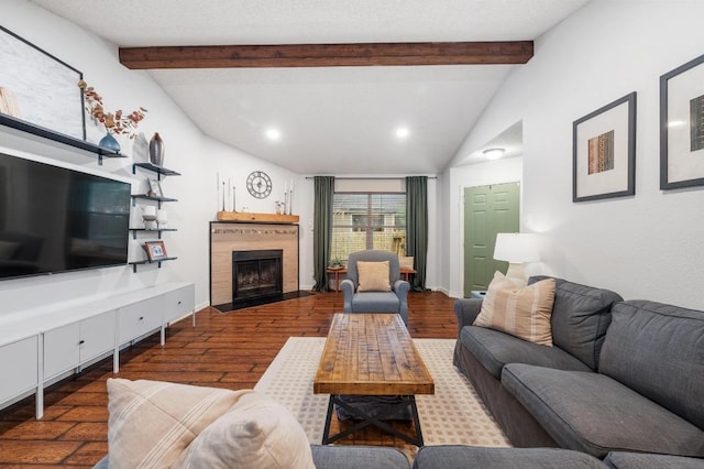 12721 Heinemann Dr, Austin, TX 78727 - living room with a fireplace with flush hearth, wood finished floors, and recessed lighting