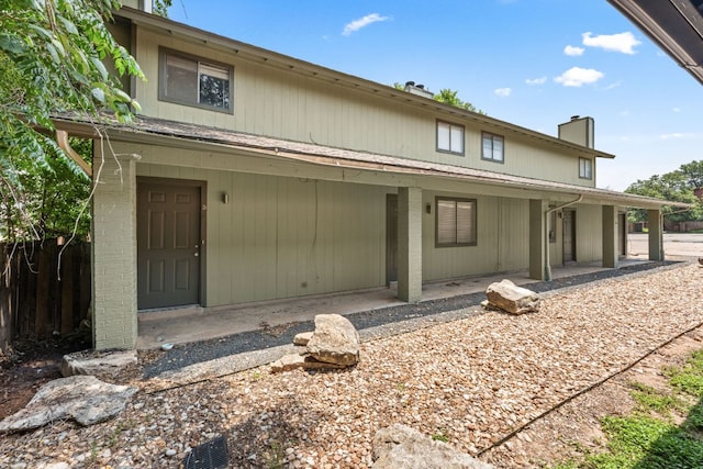 1320 Southport Dr, Austin, TX 78704 - back of property featuring a chimney