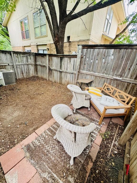 1320 Southport Dr, Austin, TX 78704 - fenced backyard featuring central AC unit