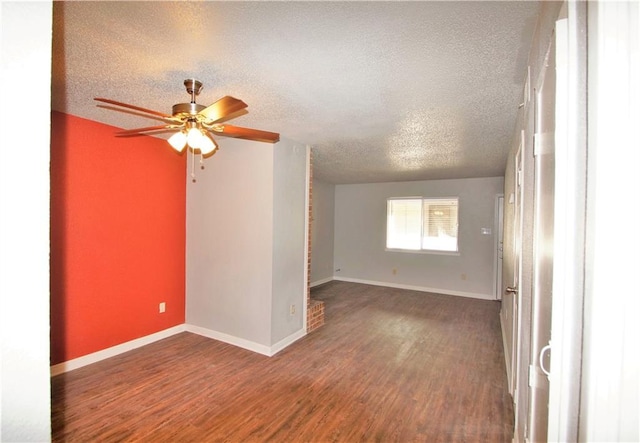 1320 Southport Dr, Austin, TX 78704 - unfurnished room featuring ceiling fan, wood finished floors, a textured ceiling, and baseboards