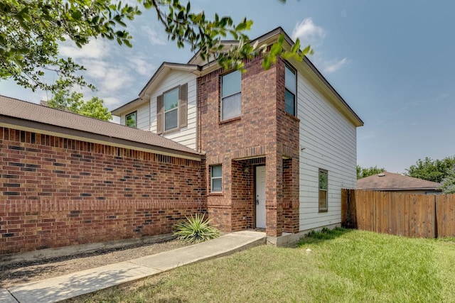 8912 Norwich Castle, Austin, TX 78747 - rear view of house with brick siding