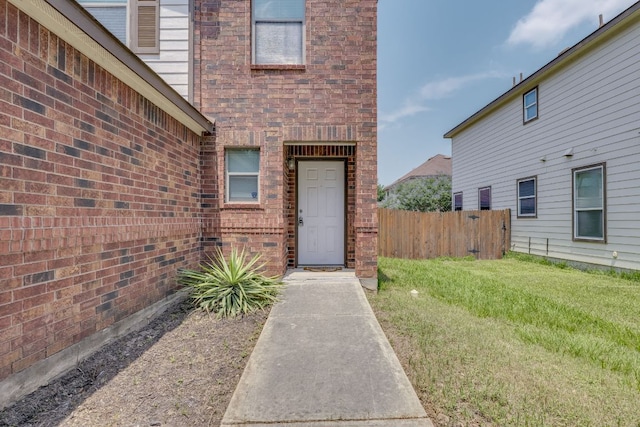 8912 Norwich Castle, Austin, TX 78747 - property entrance with brick siding