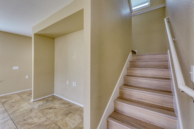 8912 Norwich Castle, Austin, TX 78747 - stairs with baseboards