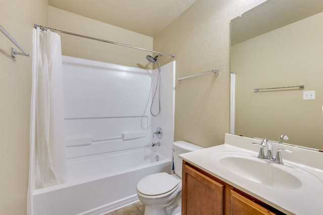 8912 Norwich Castle, Austin, TX 78747 - full bath featuring toilet, vanity, shower / bath combination with curtain, tile patterned floors, and a textured wall
