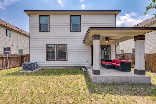 8912 Norwich Castle, Austin, TX 78747 - rear view of property with a ceiling fan, an outdoor living space, a patio, and a fenced backyard