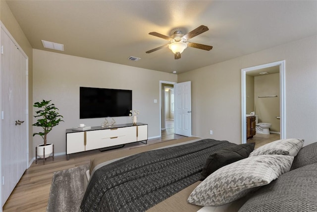 8912 Norwich Castle, Austin, TX 78747 - bedroom featuring light wood-type flooring, ensuite bathroom, and ceiling fan