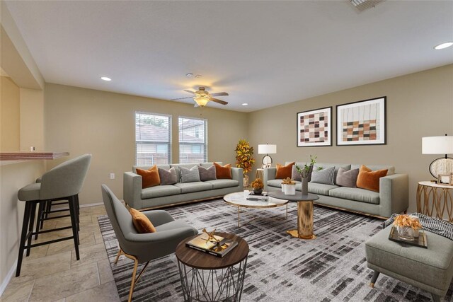 8912 Norwich Castle, Austin, TX 78747 - living room with a ceiling fan, recessed lighting, and light stone finish flooring