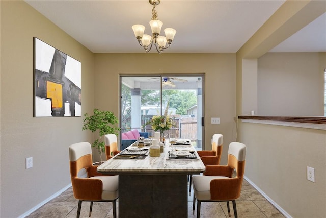 8912 Norwich Castle, Austin, TX 78747 - dining space with baseboards and a chandelier