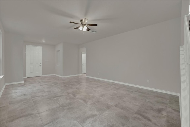 2038 Wind Chime Way, New Braunfels, TX 78130 - spare room featuring ceiling fan, arched walkways, baseboards, and recessed lighting
