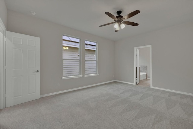 2038 Wind Chime Way, New Braunfels, TX 78130 - unfurnished room featuring light carpet, a ceiling fan, and baseboards