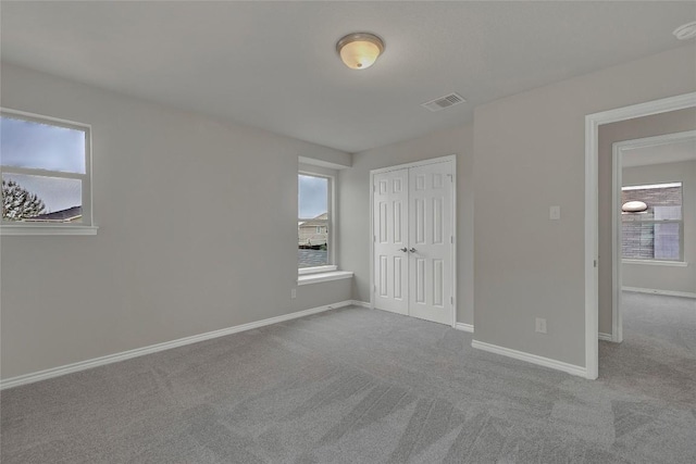 2038 Wind Chime Way, New Braunfels, TX 78130 - unfurnished bedroom featuring carpet floors, baseboards, and a closet