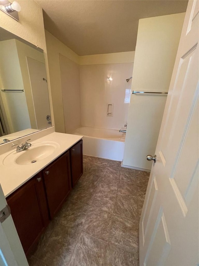 408 Azurite Dr, Jarrell, TX 76537 - full bathroom featuring vanity and shower / bath combination