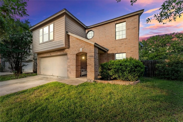 491 Emerald Fields Ln, Kyle, TX 78640 - view of front of house with brick siding, driveway, and an attached garage