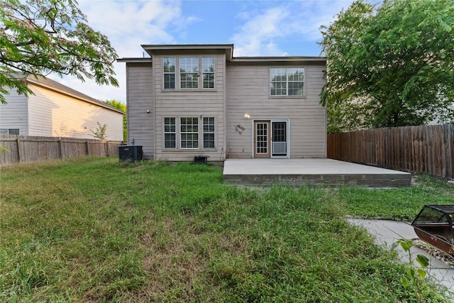 491 Emerald Fields Ln, Kyle, TX 78640 - rear view of property with a patio and central AC unit