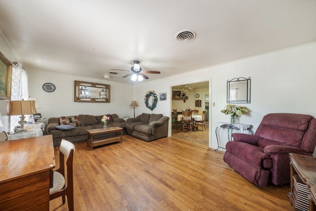 704 6th St, Blanco, TX 78606 - living room featuring light wood-style floors and ceiling fan