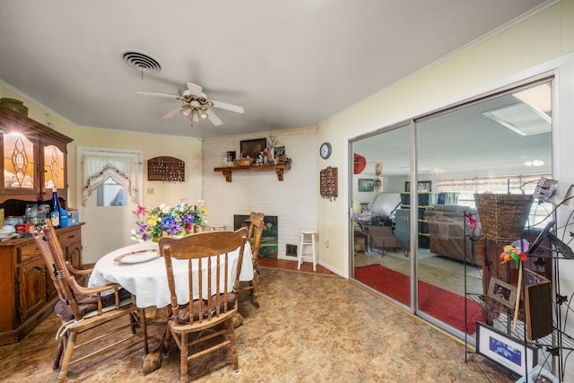 704 6th St, Blanco, TX 78606 - dining area with a ceiling fan and ornamental molding