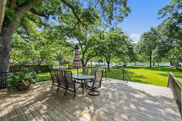 2603 Pearce Rd, Austin, TX 78730 - wooden terrace with a lawn and outdoor dining area