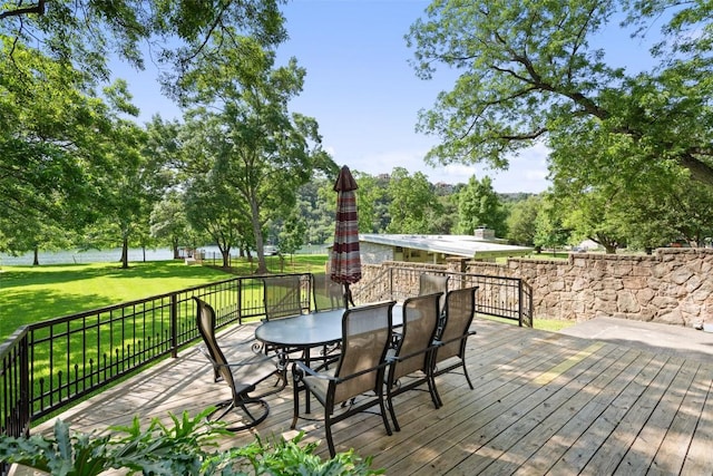 2603 Pearce Rd, Austin, TX 78730 - deck featuring outdoor dining space, a lawn, and a water view