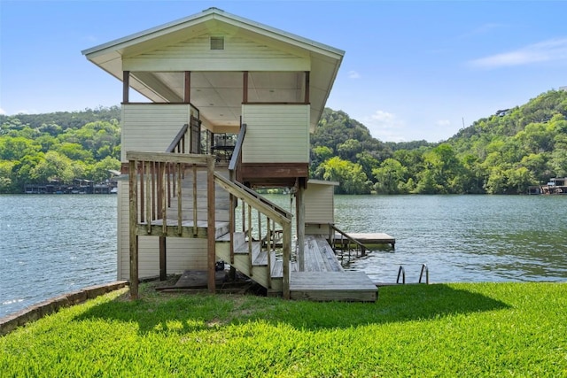 2603 Pearce Rd, Austin, TX 78730 - dock featuring a water view, a forest view, a lawn, and stairs