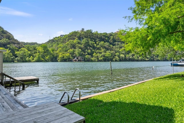 2603 Pearce Rd, Austin, TX 78730 - dock featuring a wooded view and a water view