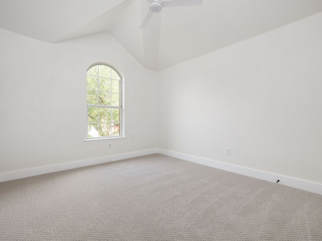 9307 Edwardson Ln, Austin, TX 78749 - empty room with light colored carpet, baseboards, lofted ceiling, and ceiling fan
