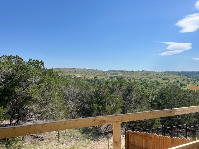 19217 Hopper Ln, Austin, TX 78738 - view of mountain background featuring a heavily wooded area