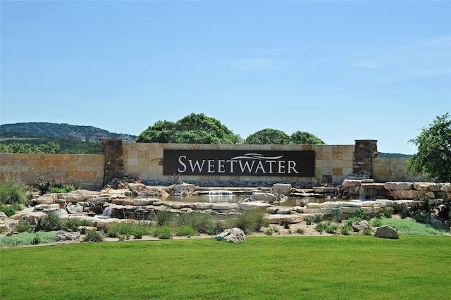 19217 Hopper Ln, Austin, TX 78738 - community / neighborhood sign featuring a lawn and a mountain view
