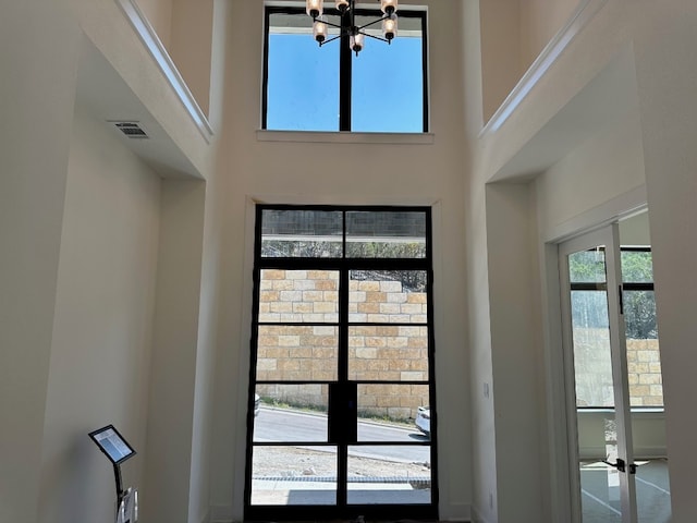 104 High View Trl, Lakeway, TX 78738 - detailed view of a chandelier and french doors