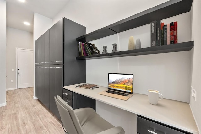4510 Terry-O Ln Unit 108, Austin, TX 78745 - office area featuring built in desk, light wood-style flooring, recessed lighting, and baseboards