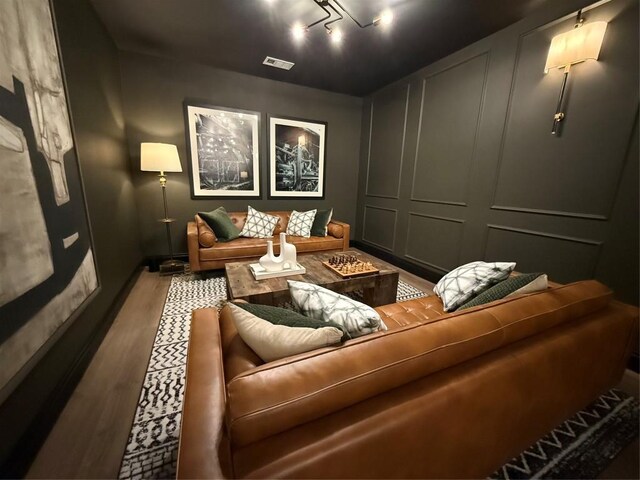 4510 Terry-O Ln Unit 108, Austin, TX 78745 - home theater room with wood finished floors and baseboards