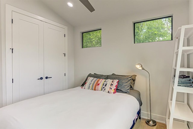 600 Blackson Ave Unit 2, Austin, TX 78752 - bedroom with wood finished floors, a closet, vaulted ceiling, a ceiling fan, and recessed lighting