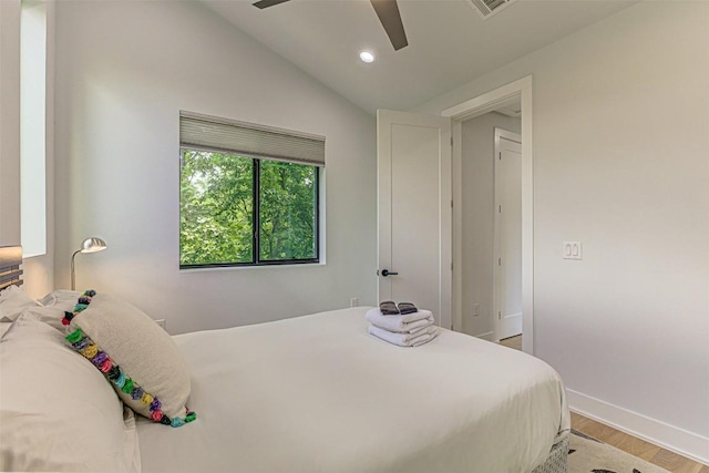 600 Blackson Ave Unit 2, Austin, TX 78752 - bedroom with wood finished floors, baseboards, vaulted ceiling, ceiling fan, and recessed lighting