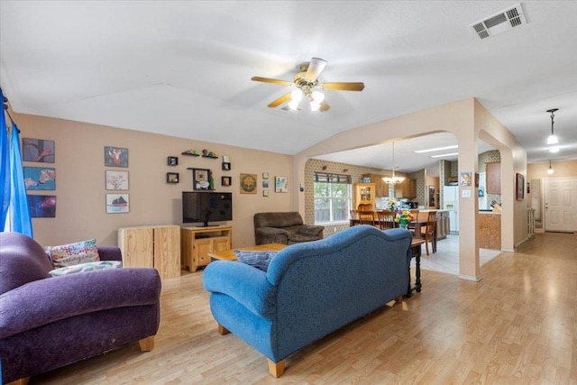 4125 Licorice Ln, Austin, TX 78728 - living room featuring light wood-type flooring, a ceiling fan, and vaulted ceiling