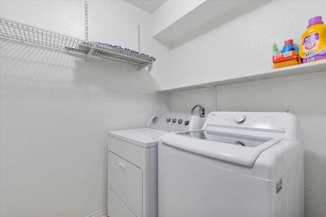4125 Licorice Ln, Austin, TX 78728 - washroom featuring separate washer and dryer