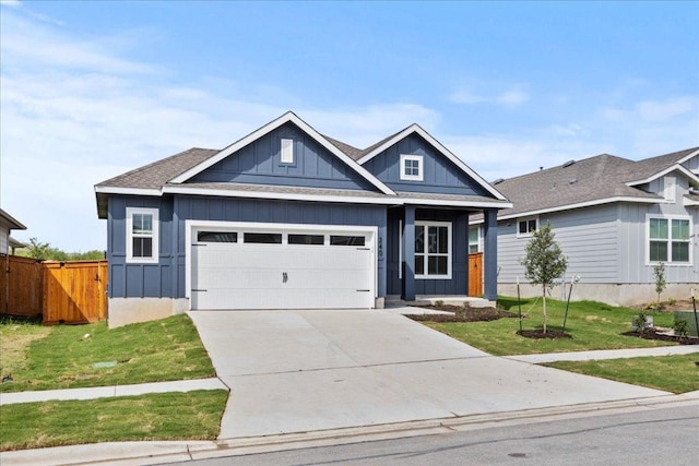 240 Camino Verde Dr, San Marcos, TX 78666 - view of front of property featuring a garage, board and batten siding, and driveway
