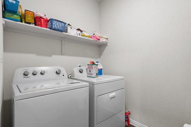 110 Saide St, Georgetown, TX 78626 - laundry room with washing machine and clothes dryer and baseboards