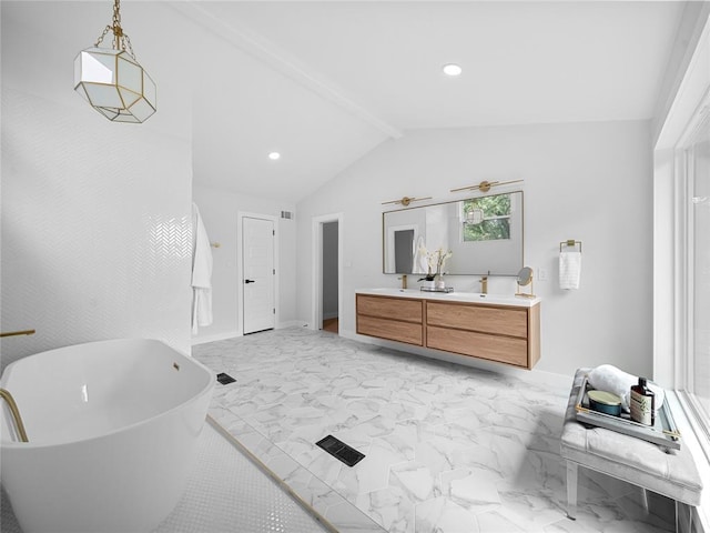 2004 N Cuernavaca Dr, Austin, TX 78733 - full bathroom with a soaking tub, double vanity, vaulted ceiling, recessed lighting, and marble finish floors