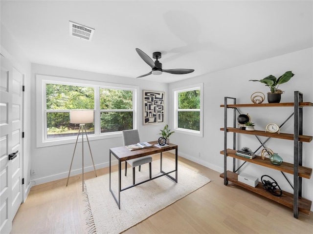 2004 N Cuernavaca Dr, Austin, TX 78733 - office area with a ceiling fan and light wood finished floors