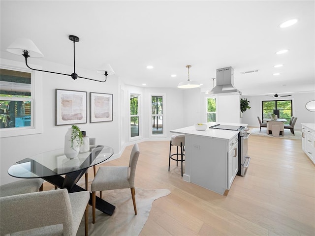 2004 N Cuernavaca Dr, Austin, TX 78733 - dining area featuring recessed lighting, light wood-style floors, and ceiling fan